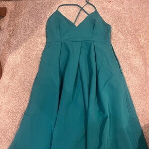 Medium length turquoise dress